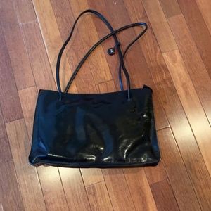 Monsac black leather shoulder bag.